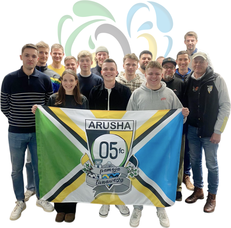 Teambild mit Arusha-Team-Fahne