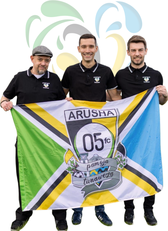 Teambild mit Arusha-Team-Fahne